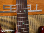 Fender American Deluxe Ash Stratocaster with a Premium Ash Body Finished in a Tabacco Sunburst