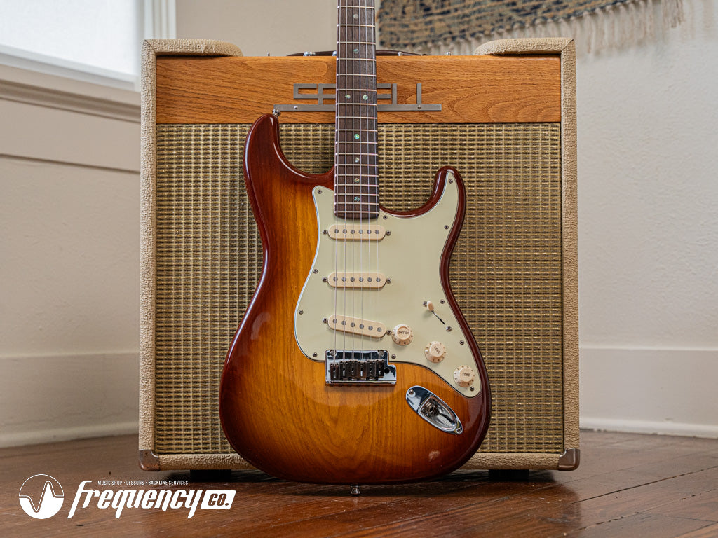 Fender American Deluxe Ash Stratocaster with a Premium Ash Body Finished in a Tabacco Sunburst